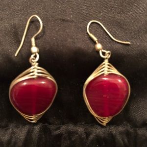 silver tone red stone dangle earrings